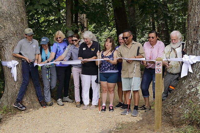  On August 10, Master Naturalists, park staff, YCC members and family, project donors and supporters gathered to cut a ribbon and unveil the new trail.