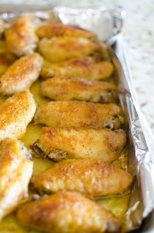 Honey Mustard Chicken Wings - chicken wings tossed in an easy homemade honey mustard sauce and baked until golden brown. Sweet, spicy, and perfect for football season!