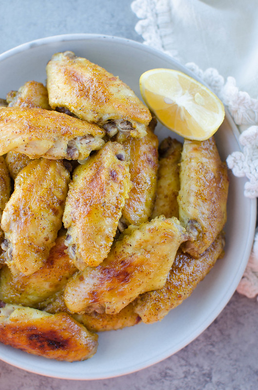 Honey Mustard Chicken Wings - chicken wings tossed in an easy homemade honey mustard sauce and baked until golden brown. Sweet, spicy, and perfect for football season!